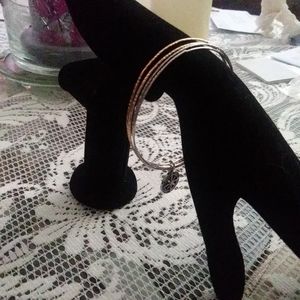 Selling very pretty bango bracelet with a charm